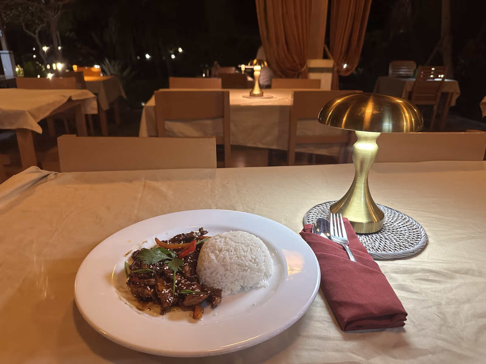 Warm evening dining atmosphere at Kavana Penida